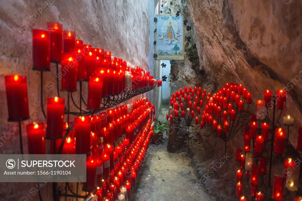 Burning candles in honor of the Virgen del Castell de Agres, Alicante, Spain, Europe