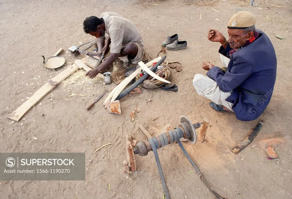 Blacksmith at work. Rajasthan, India. He belongs to the Gaduliya Lohar community, untouchable itinerant blacksmiths.