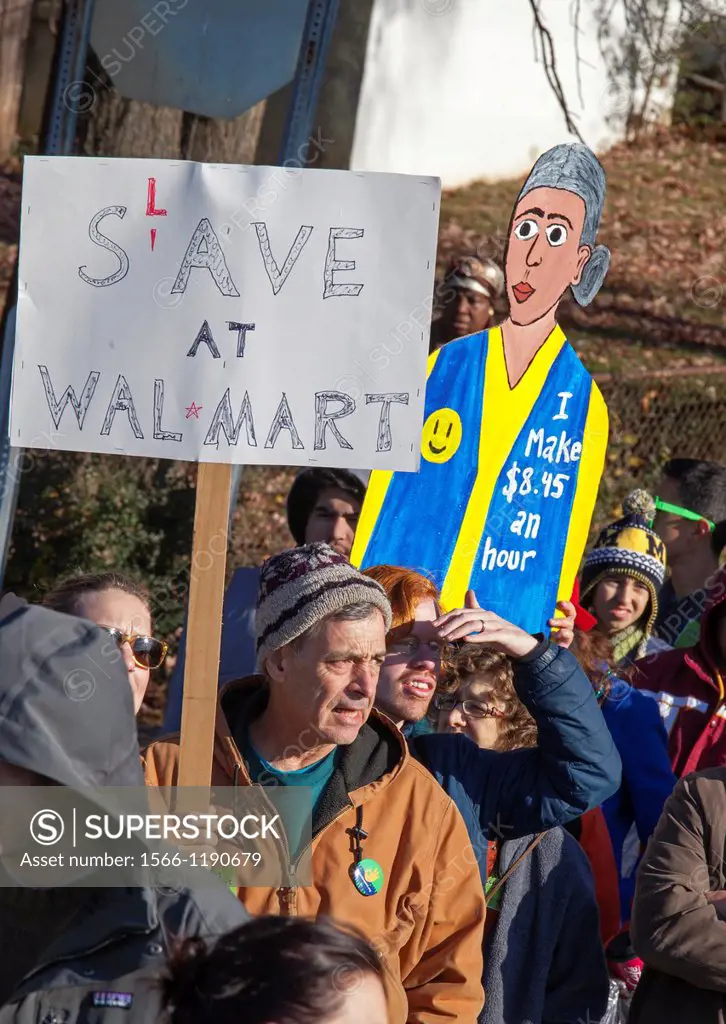 Hyattsville, Maryland - Walmart workers, some of them on strike, rally with supporters outside one of the company´s stores on Black Friday, demanding ...