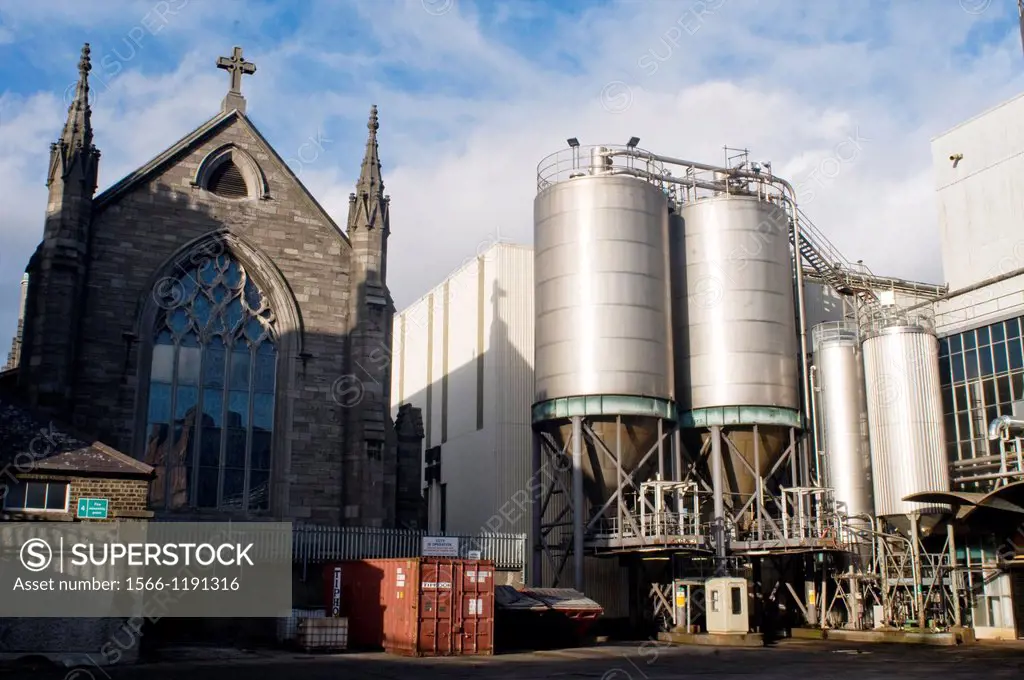 Factory brewing of Guinness in Dublin. Next, small factory historic church where they were to pray employees of the company.