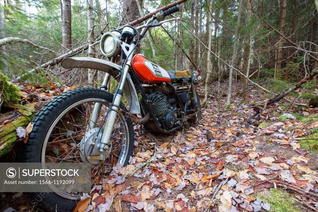 Abandoned Yamaha 250 motorcycle near the Mt Cilley Trail in Woodstock, New Hampshire USA
