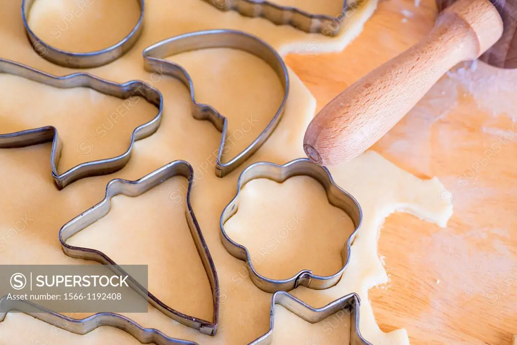 Baking Christmas Cookies - Close up of dough and cookie cutters