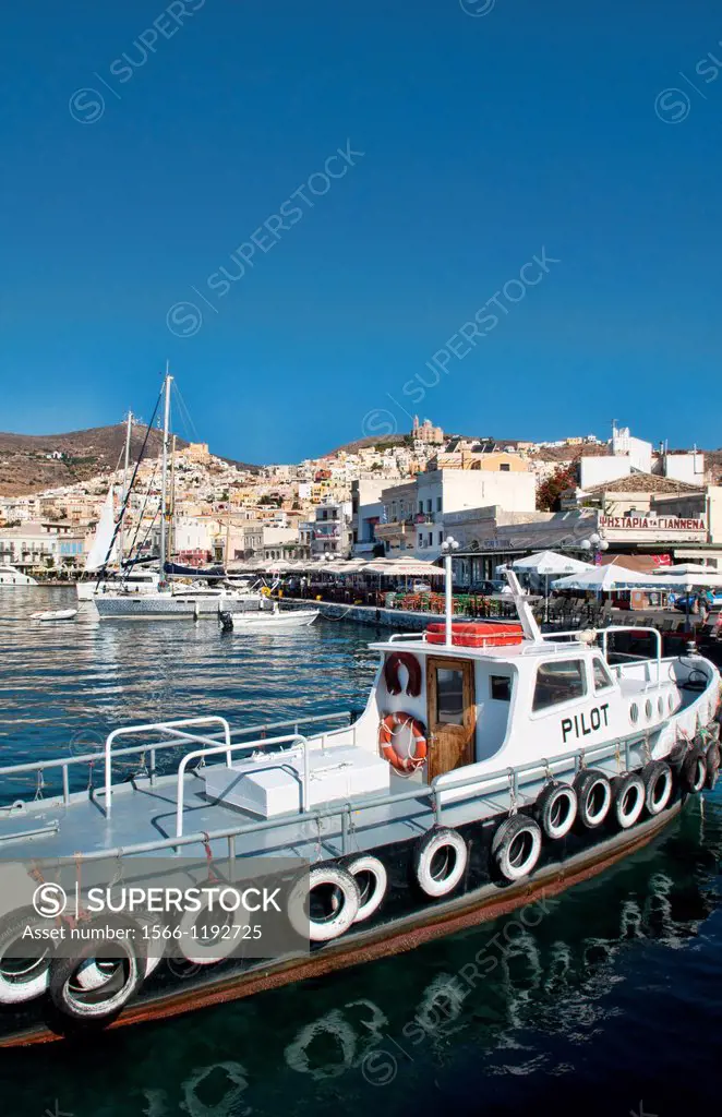 Syros Greece Islands in Hermoupolis capital in marina harbor boats ships port white buildings water boating fishing architecture