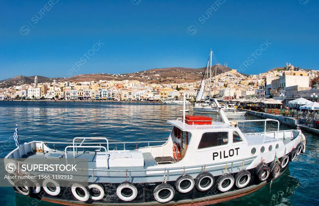 Syros Greece Islands in Hermoupolis capital in marina harbor boats ships port white buildings water boating fishing architecture