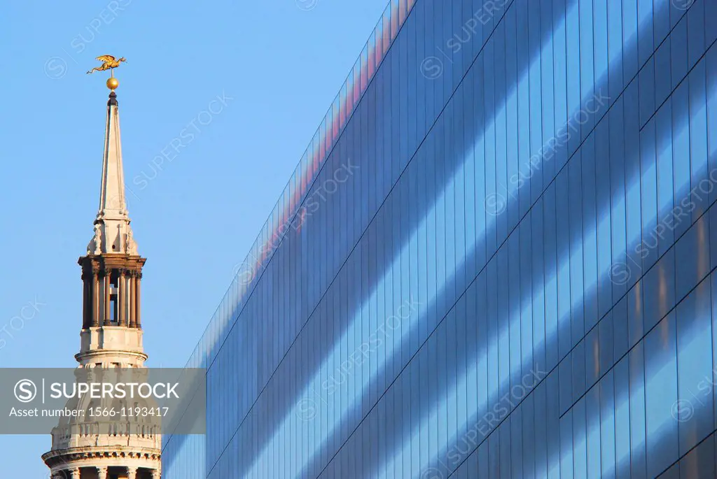 The spire of the iconic London Church, St  Mary-le-Bow, with its famous Bow Bells, contrasts with the ultra-modern architecture of One New Change, in ...