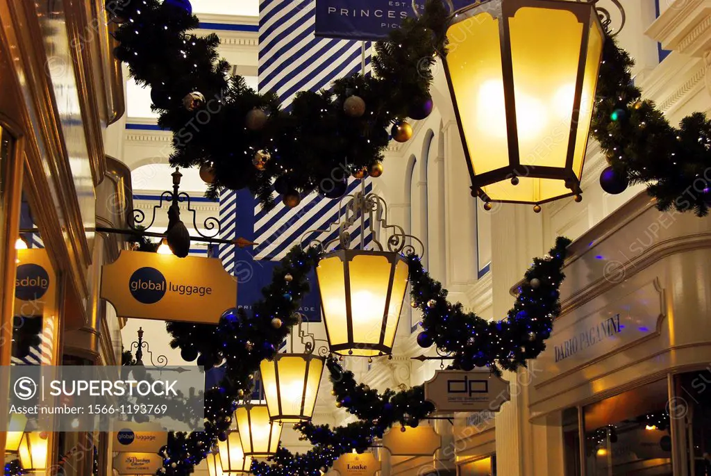 The art deco lamps of the very upmarket Piccadilly Arcade on Piccadilly, in London, UK, decorated for Christmas