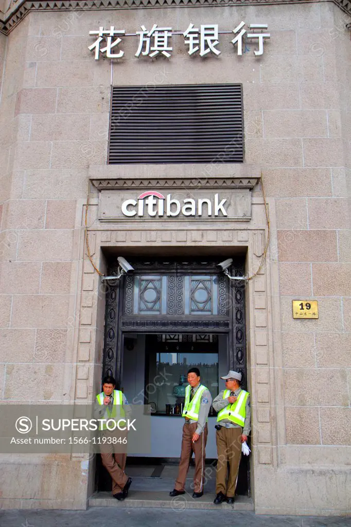 China, Shanghai, Huangpu District, The Bund, East Zhongshan Road, Art Deco Neo Classical style buildings, historic, citibank, guards, front, entrance,...