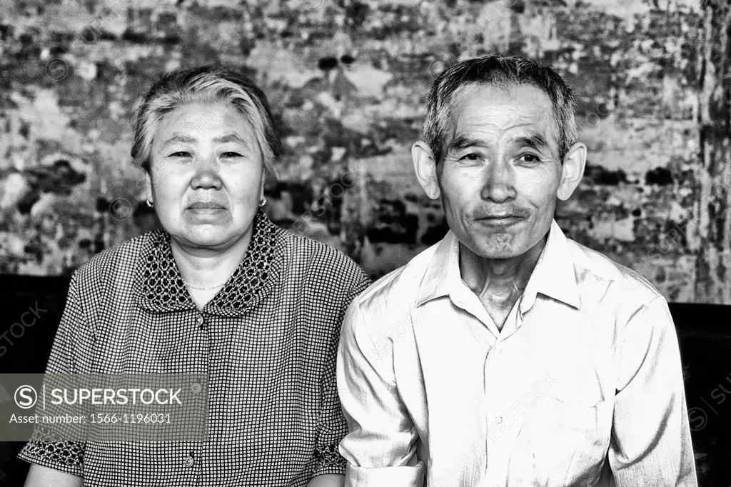 Colorful portrait of older couple in Beijing China