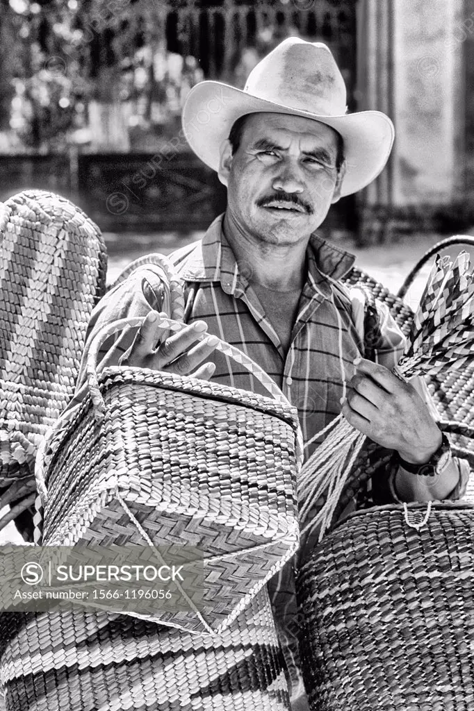 Man vendor selling baskets in San Miguel de Allende Mexico