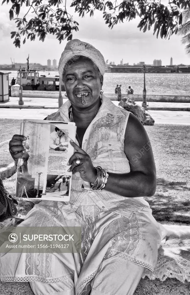 Woman Santeria religion in white tarot card reader in Regla area of Havana Cuba