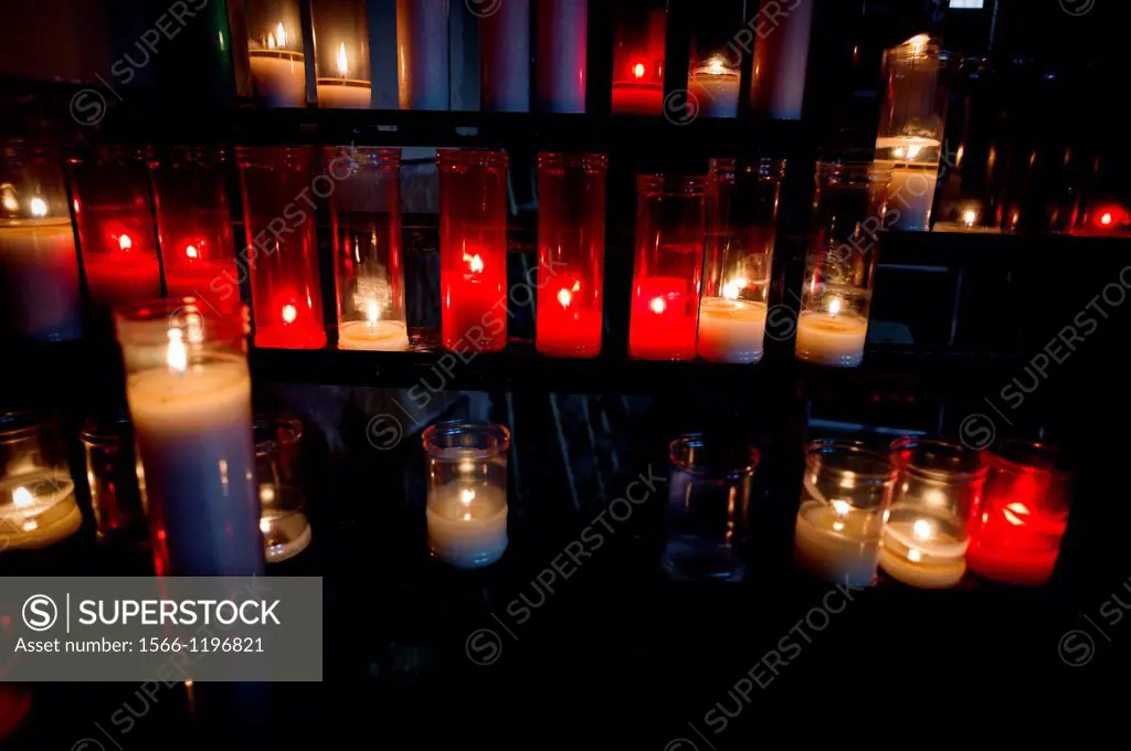 pregarias with candles in a church, worship