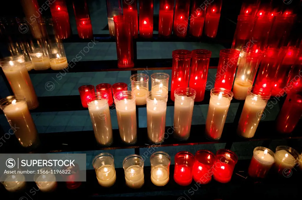 pregarias with candles in a church, worship