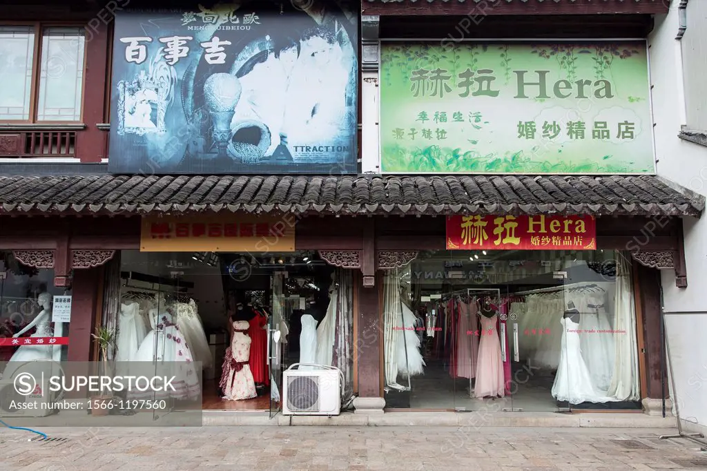 A shop selling western style wedding gowns in Suzhou, China  Suzhou is one of the largest producers of wedding dresses in the world