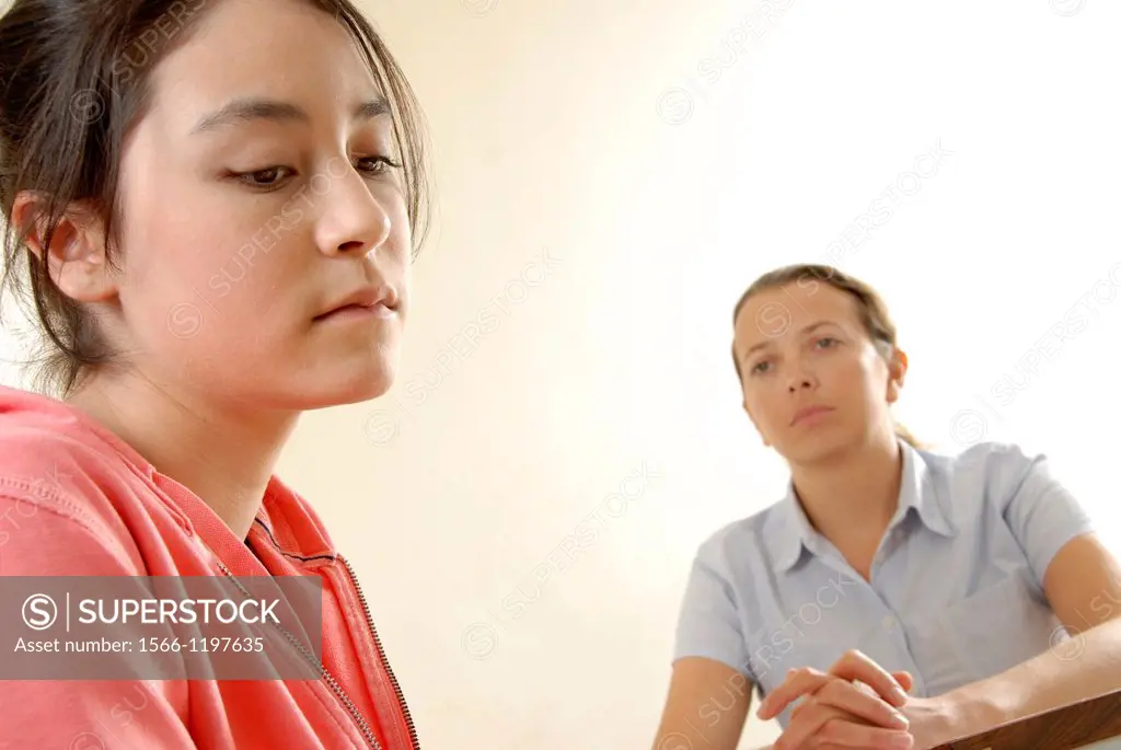 Counselling  Counsellor listening to a depresssed patient during a consultation