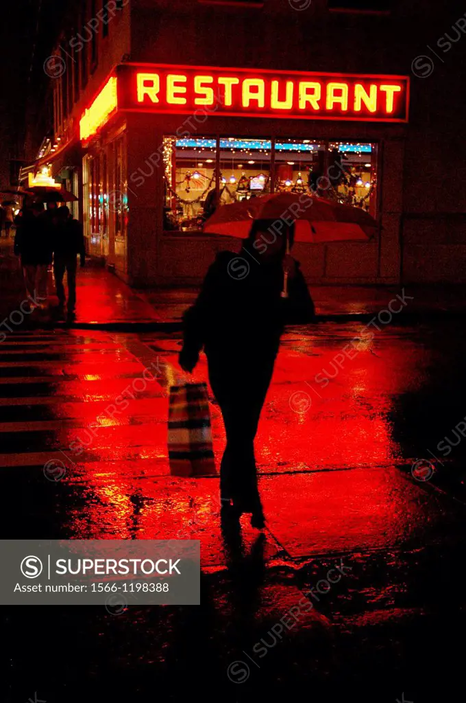 New York City, rain reflection, nighttime, by a restaurant near Columbia University, Morningside Heights, Uptown Manhattan