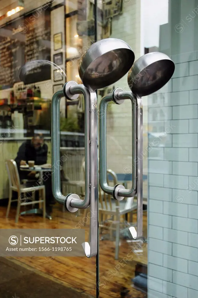 New York City, dippers in place of door handles, on a restaurant door, Manhattan