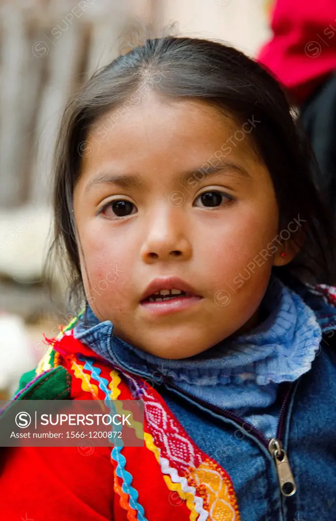 Portrait of young girl with traditional dress in Cusco Cuzco Peru South America