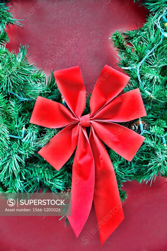 Detail of Red Bow on a Holiday Christmas Wreath