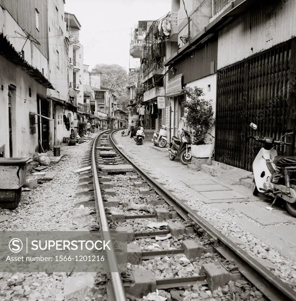 Daily life by the train tracks in Hanoi in Vietnam