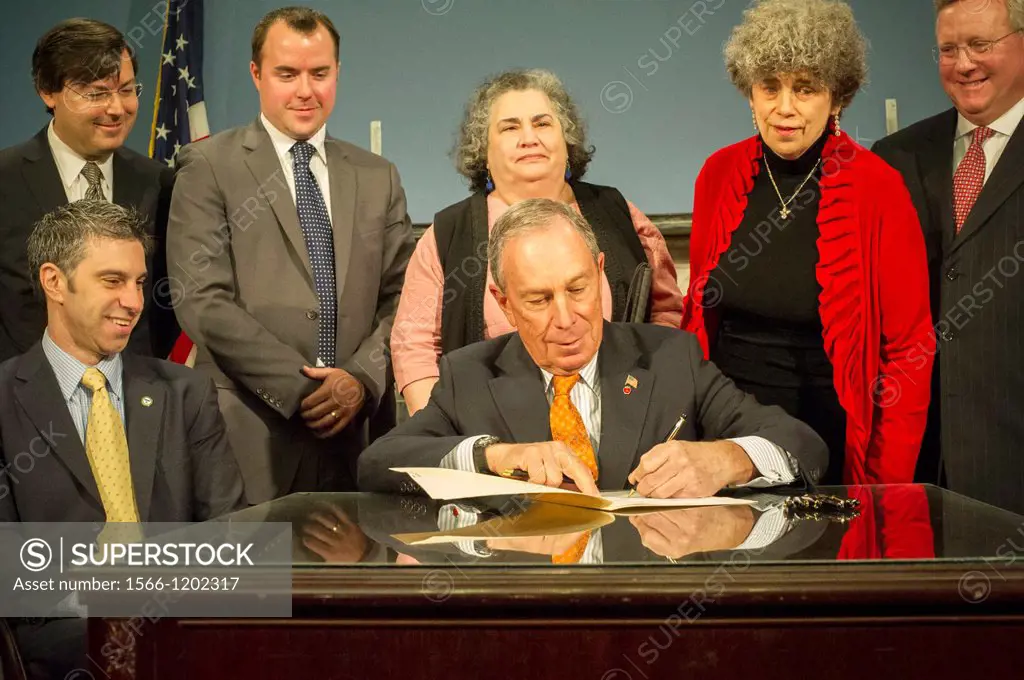 Mayor Mike Bloomberg, joined by City Council members and government officials, at a bill signing ceremony in the Blue Room in City Hall in New York, o...