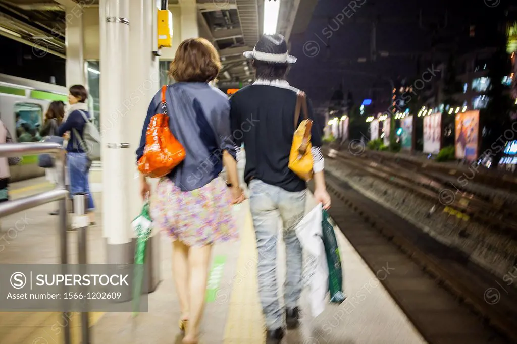 Couple in Harajuku Railway station JR Yamanote Line Harajuku,Tokyo, Japan