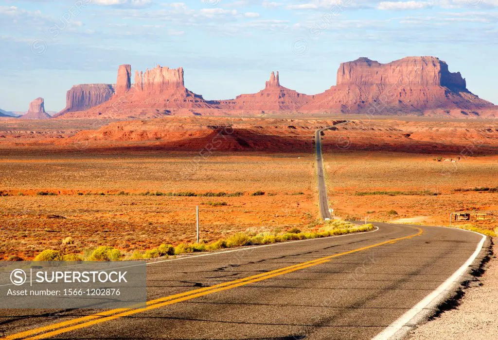 One of the most famous images of the Monument Valley is the long straight road US 163leading across flat desert towards sandstone buttes and pinnacles...