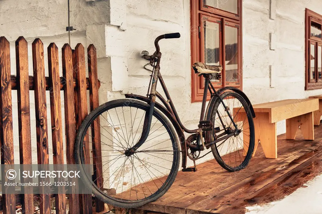 Vintage bicycle in Rural Architecture Museum open air museum in Sanok, Poland