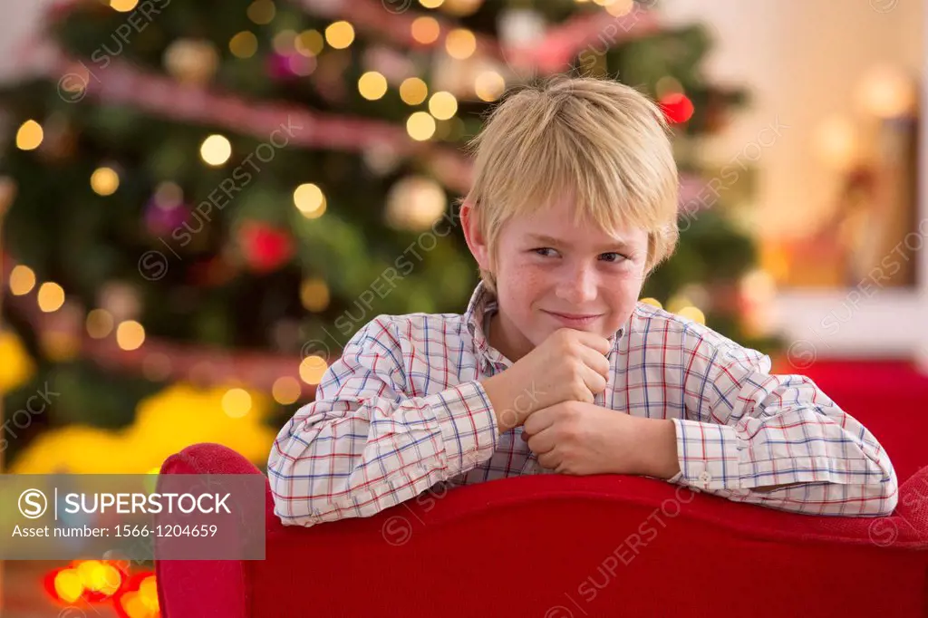 Young boy looking forward for Christmas