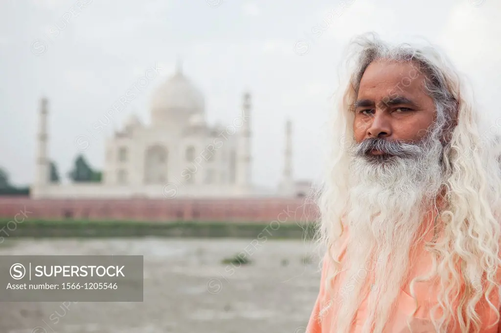 Indian Holy Man In Front Of Taj Mahal, Agra, Uttar Pradesh, India