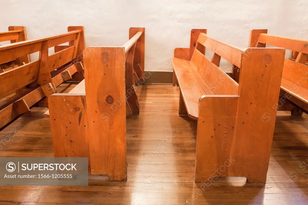 Wooden church pews, San Miguel Chapel interior, Santa Fe, New Mexico