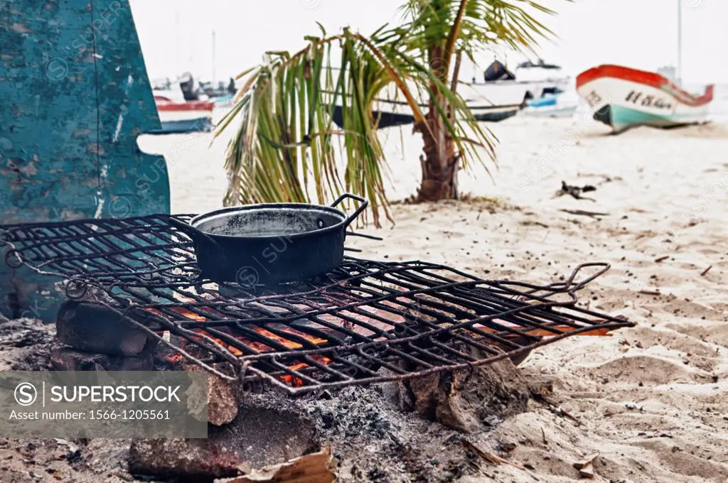 Cook fire on beach, Isla Mujeres, Yucatan Peninsula, Quintana Roo, Mexico