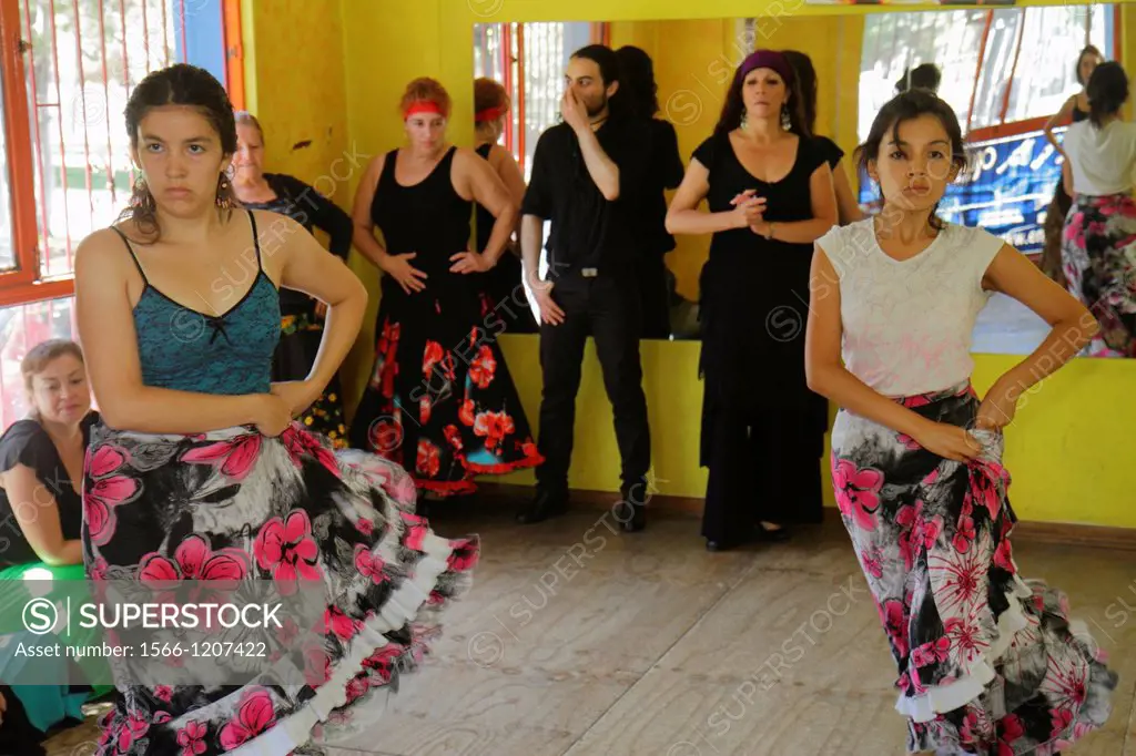 Chile, Santiago, Providencia, Avenida Ramon Carnicer, dance school, business, flamenco dancing class, studio, mirror, wood floor, Hispanic, woman, stu...
