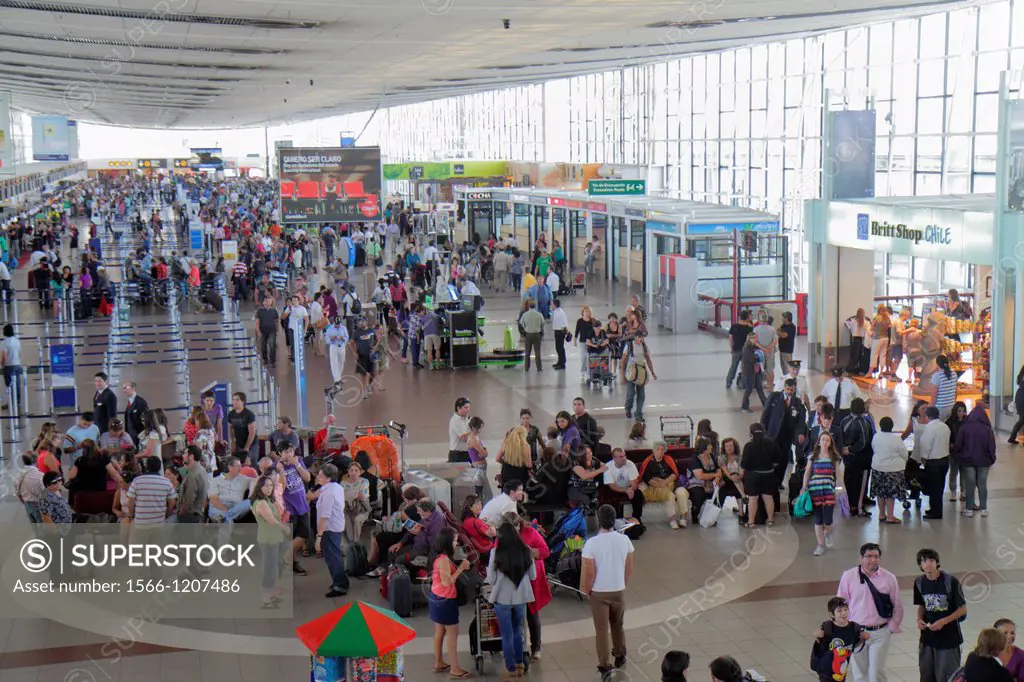 Chile, Santiago, Comodoro Arturo Merino Benítez International Airport, SCL, aviation, passenger terminal, Hispanic, woman, man, luggage, departure, ai...