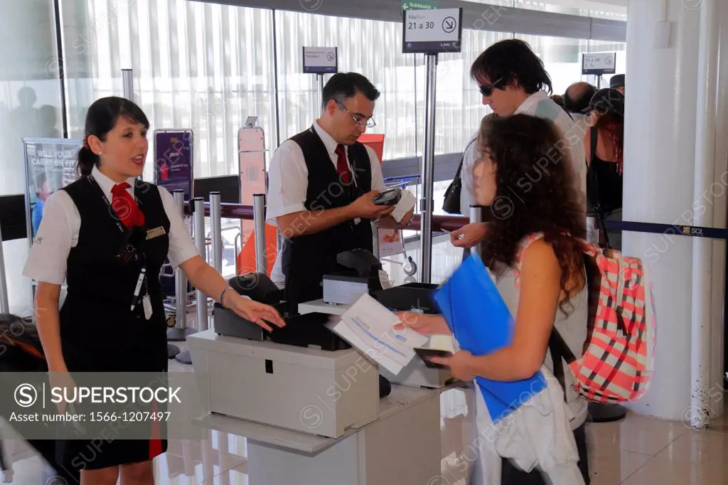 Chile, Santiago, Comodoro Arturo Merino Benítez International Airport, SCL, passenger terminal, flight gate, boarding group, row, sign, Hispanic, man,...