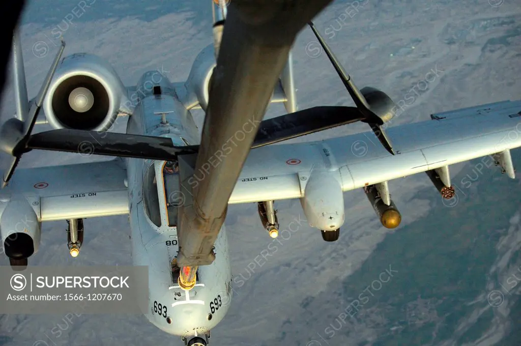 An A-10 Thunderbolt II pulls up behind a KC-10 Extender to be refueled in Southwest Asia on Sept  18, 2012  The KC-10 is an advanced tanker and cargo ...