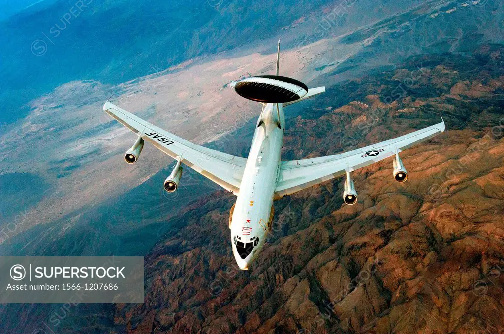 An E-3 Sentry airborne warning and control system aircraft soars over Nevada after a refueling mission during exercise Green Flag-West 13-02 at Nellis...