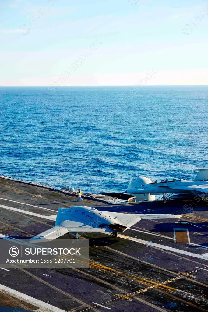ATLANTIC OCEAN Dec  9, 2012 The X-47B Unmanned Combat Air System UCAS demonstrator taxies on the flight deck of the aircraft carrier USS Harry S  Trum...