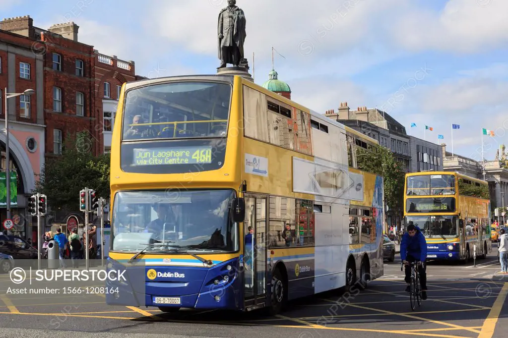 O´Connell Street, Dublin, County Dublin, Republic of Ireland, Eire, Europe  Double decker buses passing the Daniel O´Connell Monument