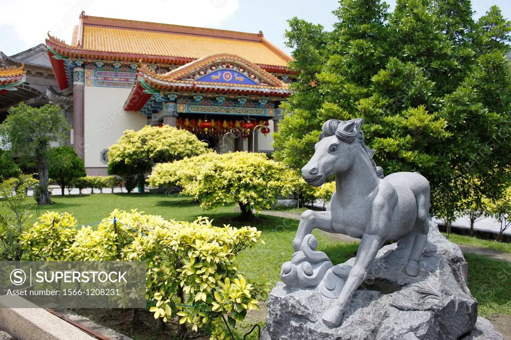 Garden and horse statue, complex of Kek Lok Si Temple, Penang, Malaysia.