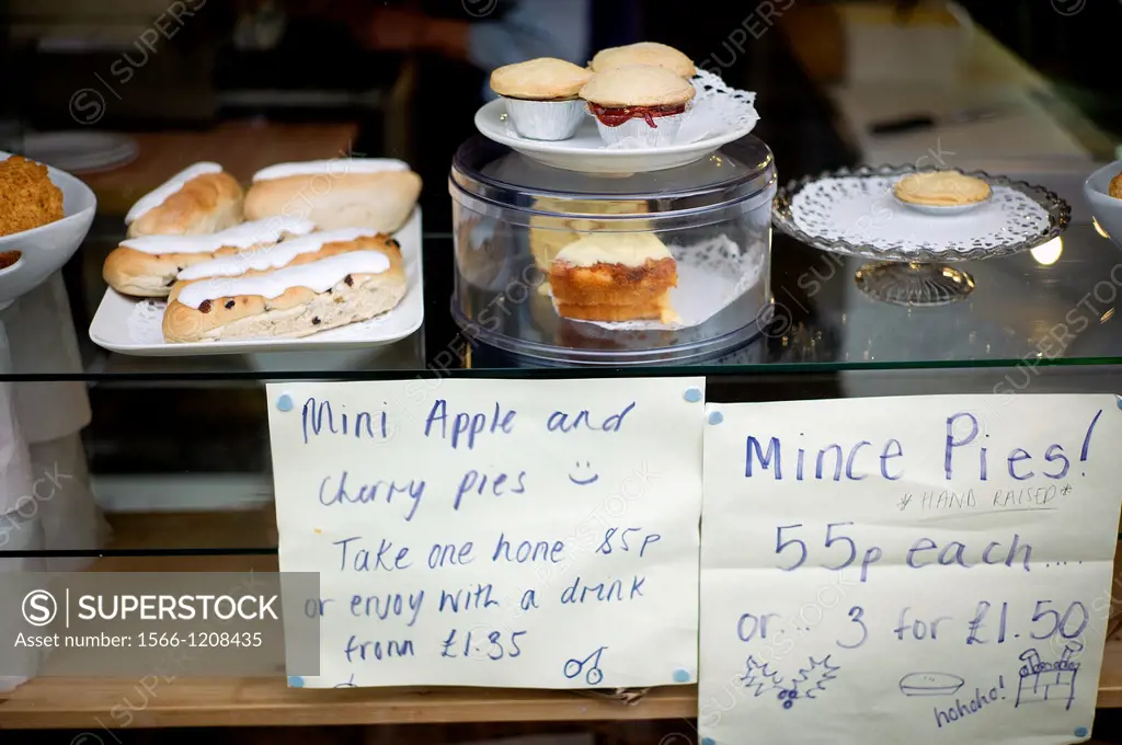 coffee shop counter with mince pies and apple and cherrie pies