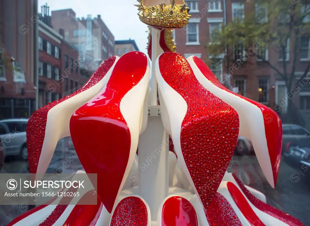 The Christian Louboutin shoe store in the West Village neighborhood of New York displays their Christmas tree window decoration made of their signatur...