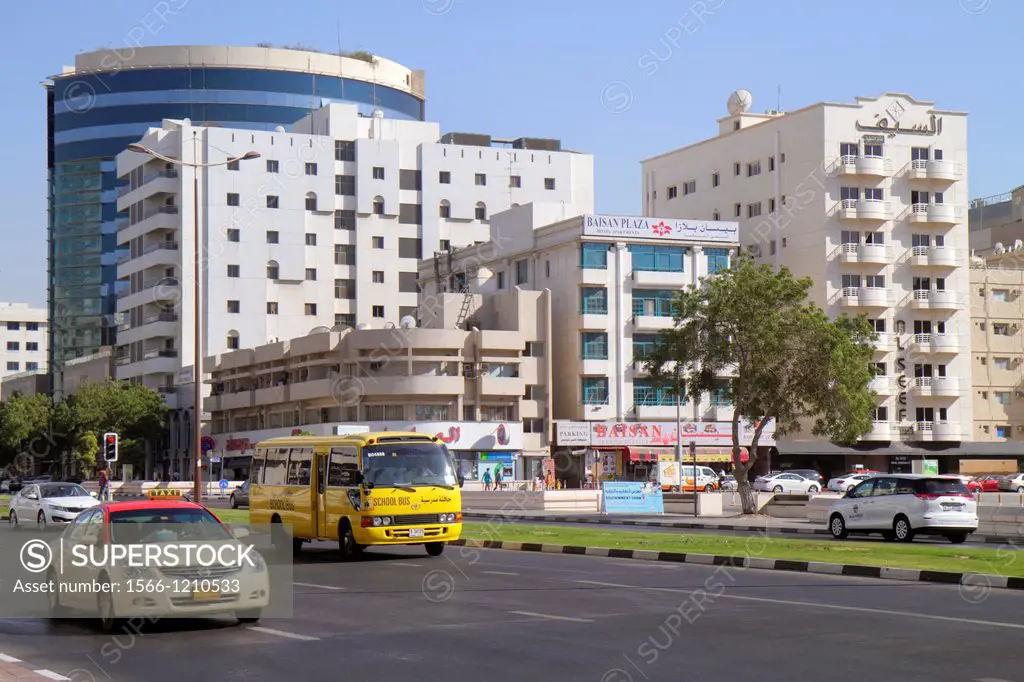 United Arab Emirates, U A E , UAE, Middle East, Dubai, Deira, Al Rigga, Al Rigga Road, English, Arabic, language, street scene, taxi cab, school bus, ...