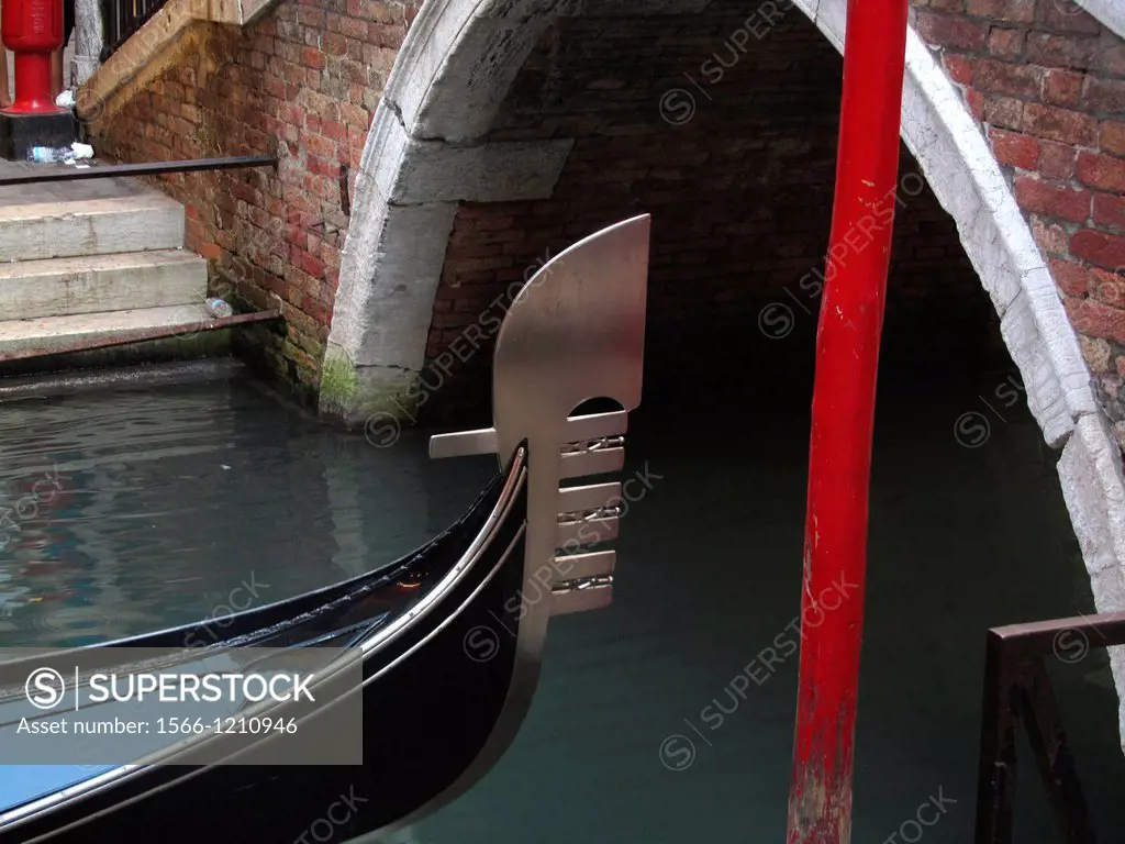 Decorative element on the bow of a gondola  It is called ´Il Ferro´ - formerly ´Il Delfino´-  The six ´teeth´ represent the six districts Sestieriof t...