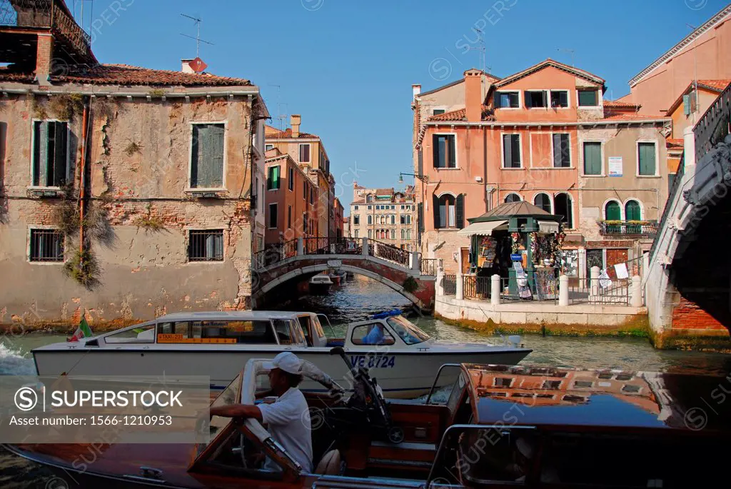 Boats crossing at the Sestiere de Dorsoduro, Venice, Veneto, Italy.