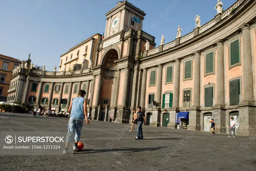 kids playing football on the Piazza Dante, Naples, Campania region, southern Italy, Europe