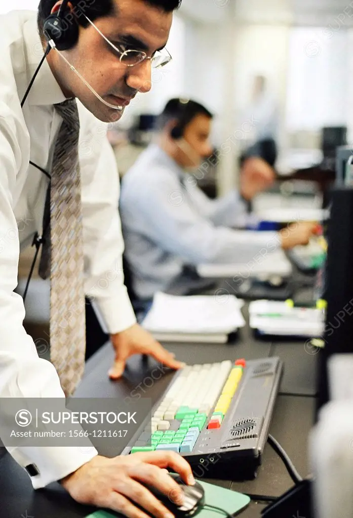 Workers in the office of Credit Suisse First Boston CSFB, a leading stockbroker and investment bank