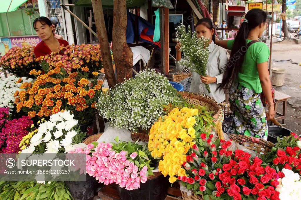 Flower seller at local market, Yangon Rangoon, Myanmar, Burma, Asia