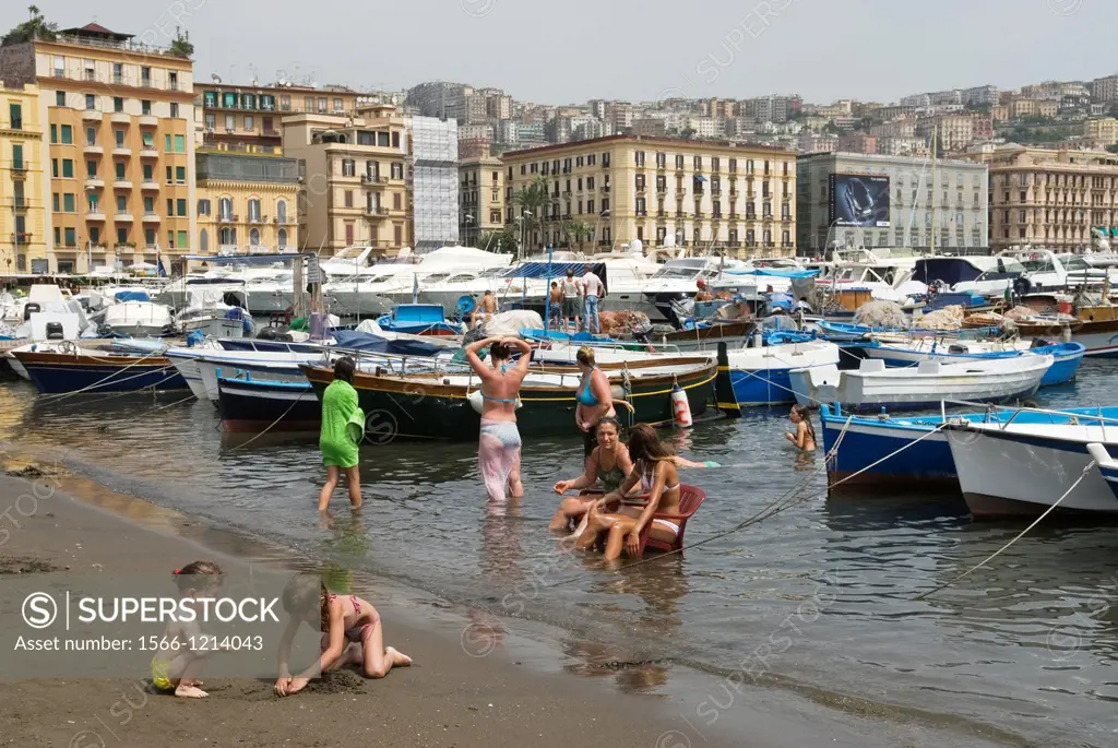 kids swimming at the harbour of Mergellina, Chiaia district, Naples, Campania region, southern Italy, Europe