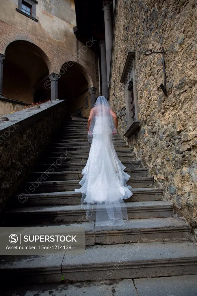 Bride walking up the stairs Castle Odescalchi Bracciano Italy