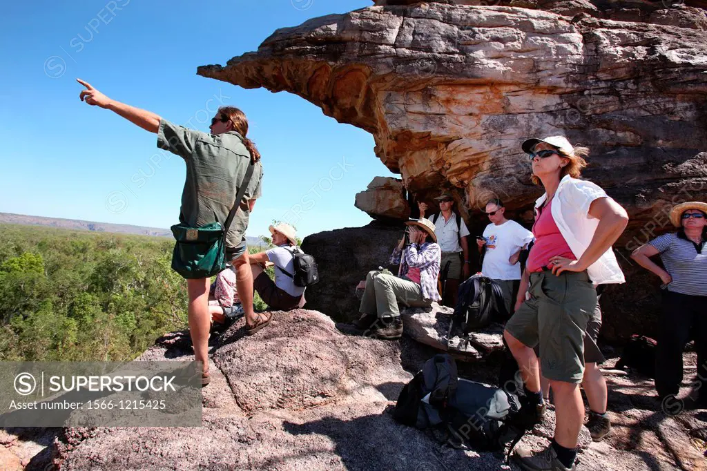 Tour guide talking to tourists in Kakadu National Park  Northern Territory, Australia